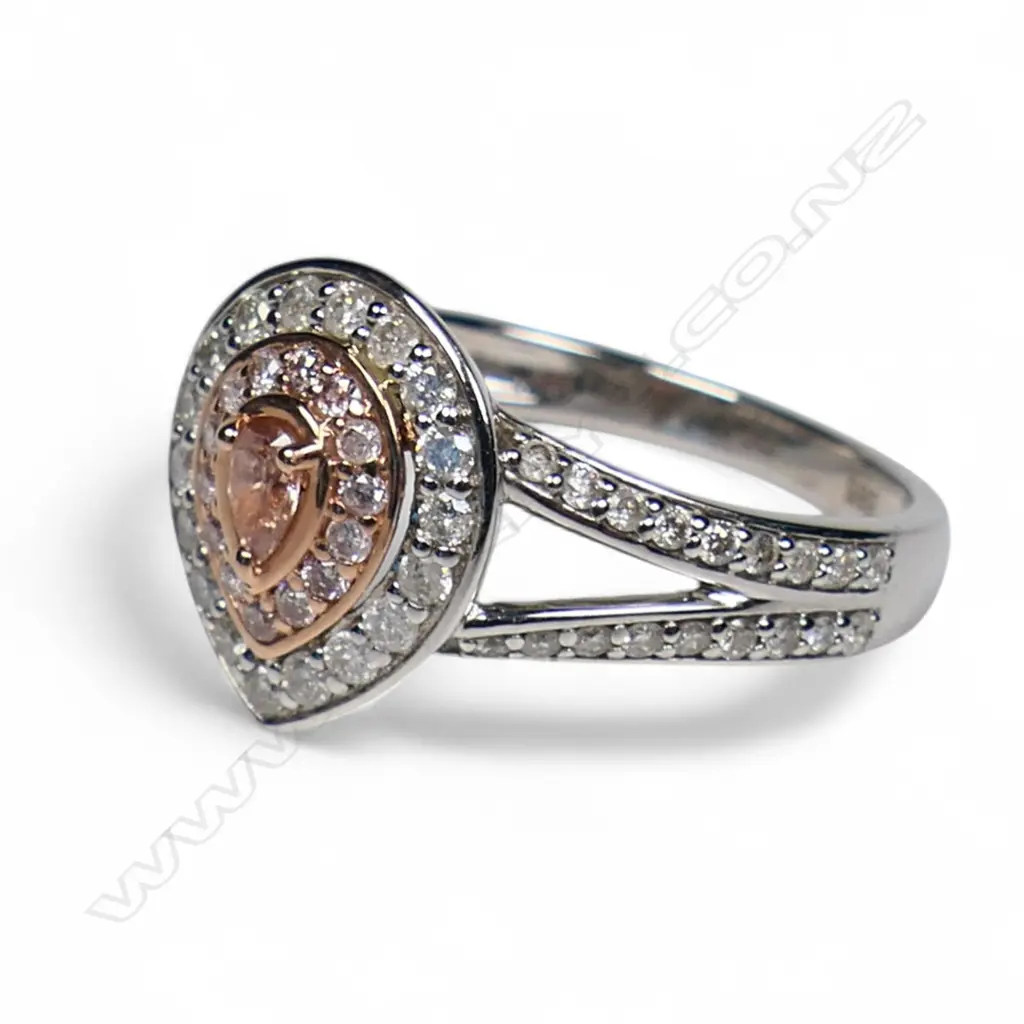 A 14ct white and rose gold pink diamond double halo split band ring, Image 1++