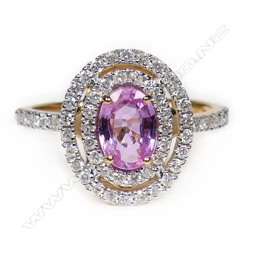 A 14ct gold pink sapphire and diamond double halo ring, Image 1++