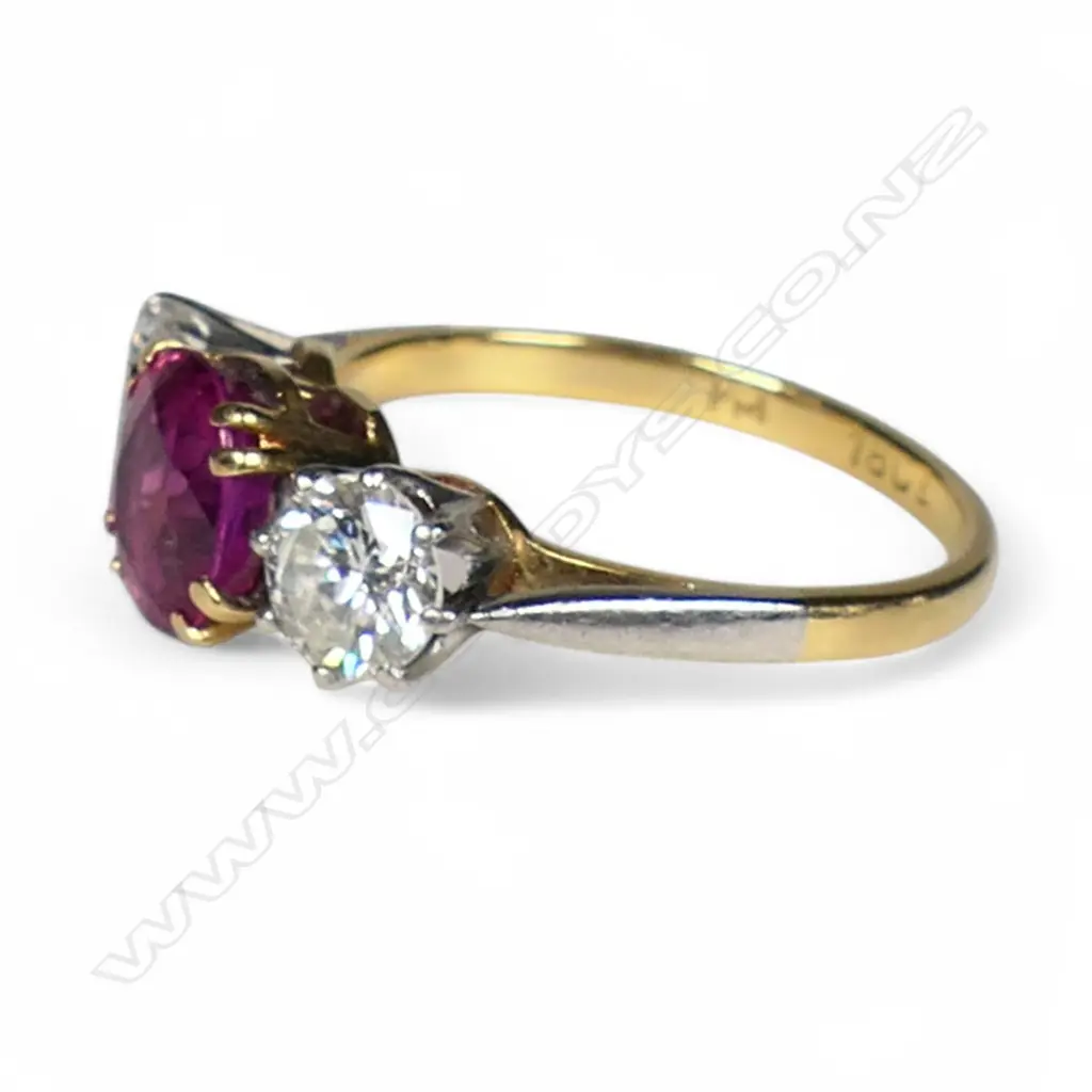 An estate 18ct gold ruby and diamond ring, Image 1++