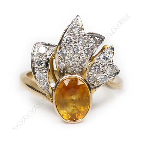 An 18ct yellow gold citrine and diamond designer ring,