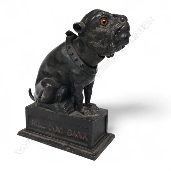 A 19thC American 1880 patent J.E. Stevens 'Bull Dog Bank' mechanical bank,