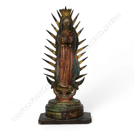 An 18thC wood figure of Our Lady of Guadalupe,