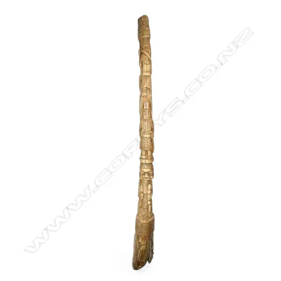 An early 20thC Nigerian ivory carved tusk section,