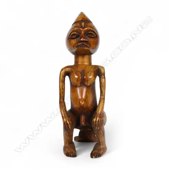 An early 20thC African ivory tribal fertility figure,
