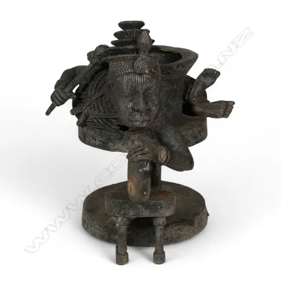An early 20thC Nigerian Benin bronze ceremonial vessel,