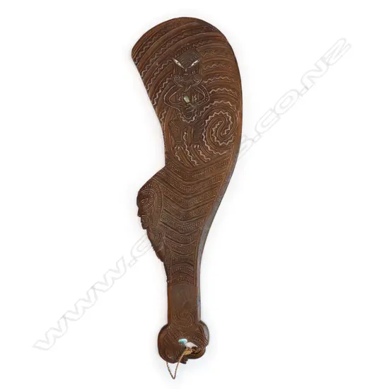 An old finely carved Māori wahaika hand club,