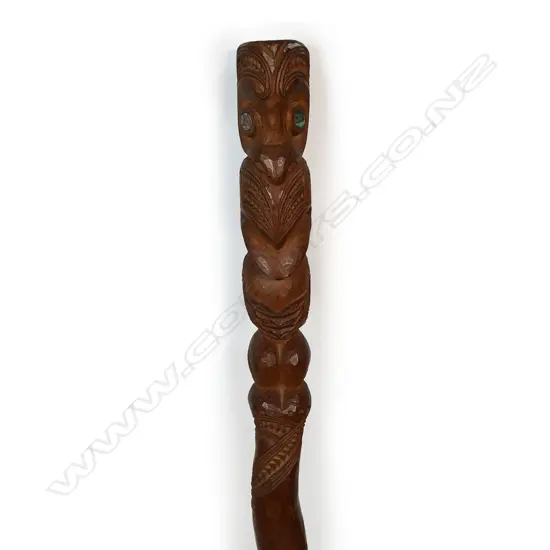 A Māori finely carved tokotoko (walking stick),
