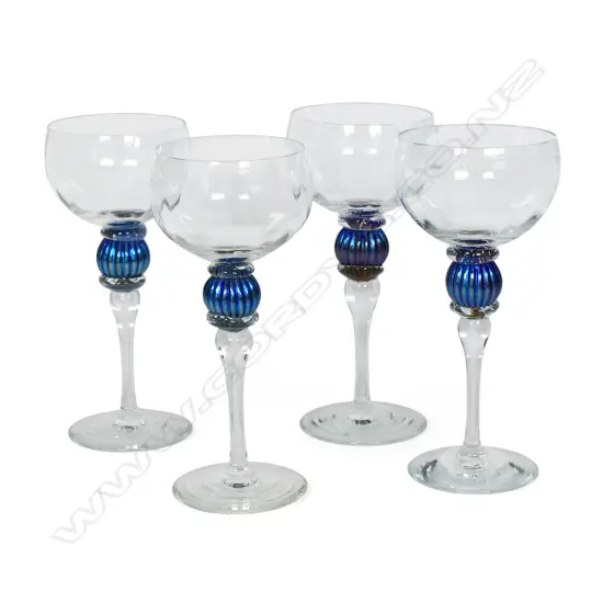 A set of four Garry Nash mouth blown glass drinking goblets,