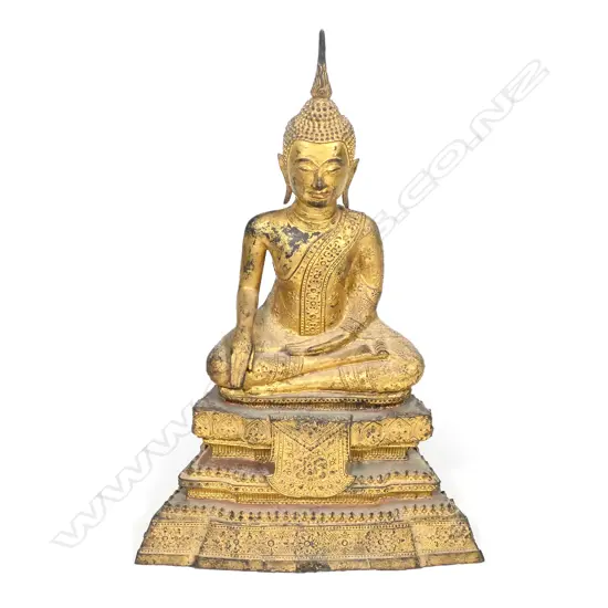 A Thai gilt bronze buddha with flame ushnisha,