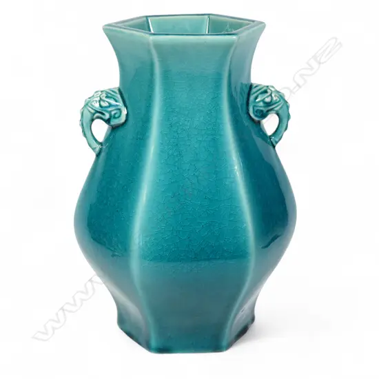 A quality oriental bright turquoise gloss glazed vase,