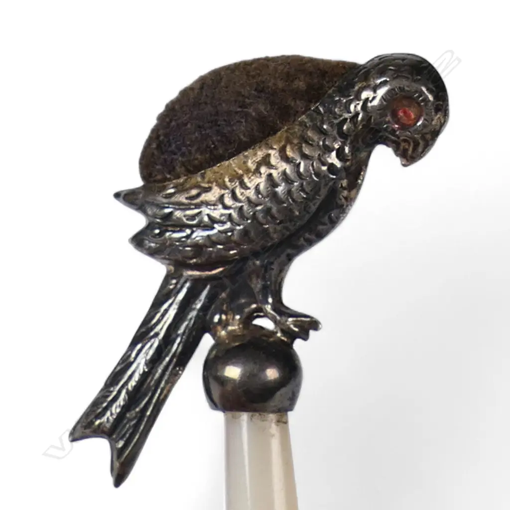 A 1920's silver and mother of pearl bird pin cushion, Image 1++
