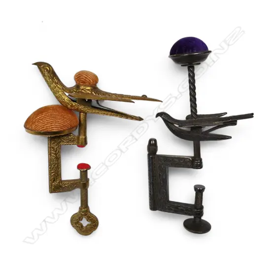 Two late 19thC Hummingbird mounted sewing clamp pin cushions,