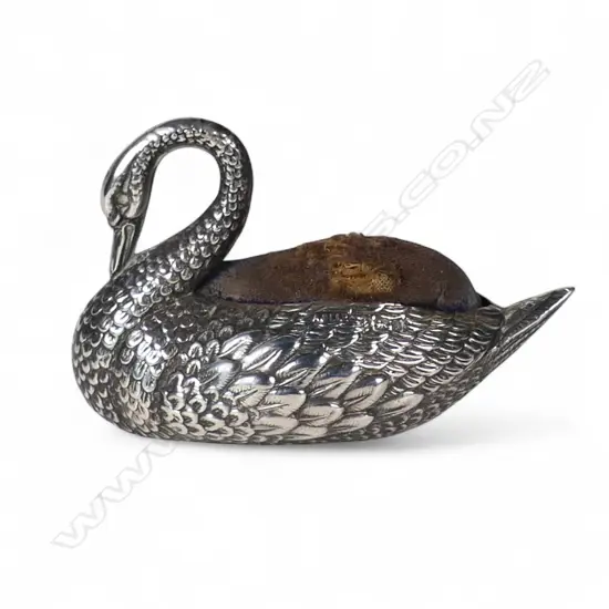 An Edwardian silver swan pin cushion,