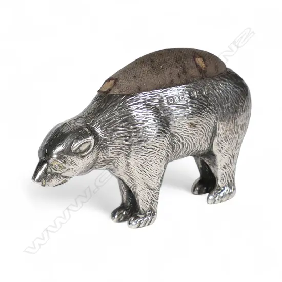 A rare Edwardian silver bear pin cushion,