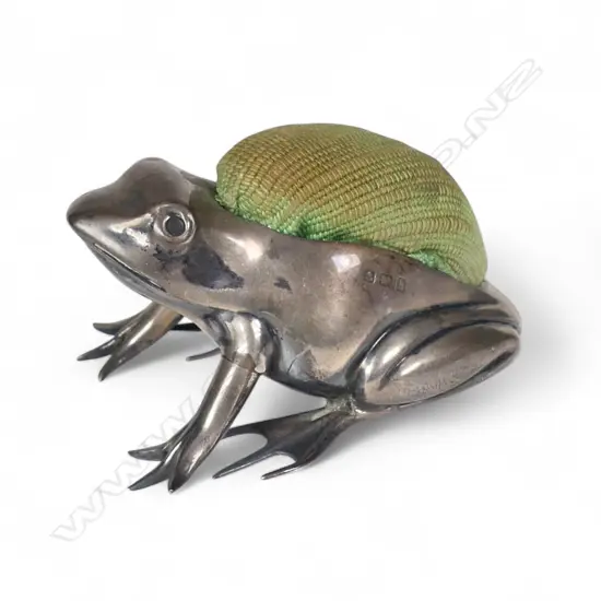 A rare Edwardian silver frog pin cushion,