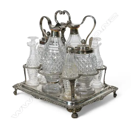 A late George III silver cruet set,