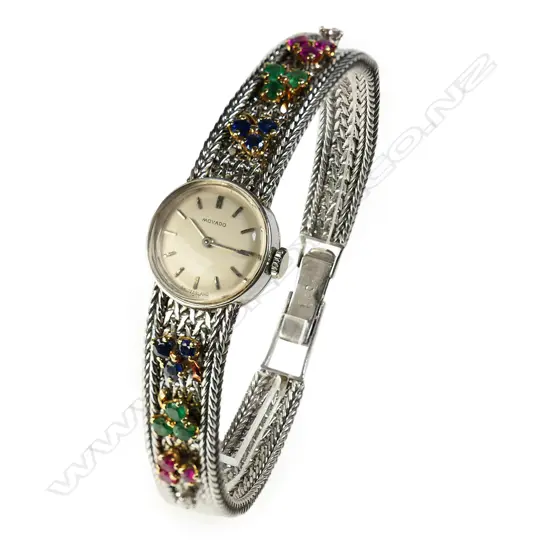 An ladies 18ct white gold and gem set Movado wristwatch,