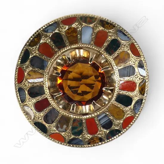 A c.1900 Scottish multi stone set shield form brooch,
