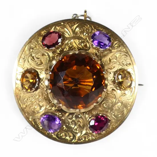 An early 20thC 9ct gold stone set brooch,