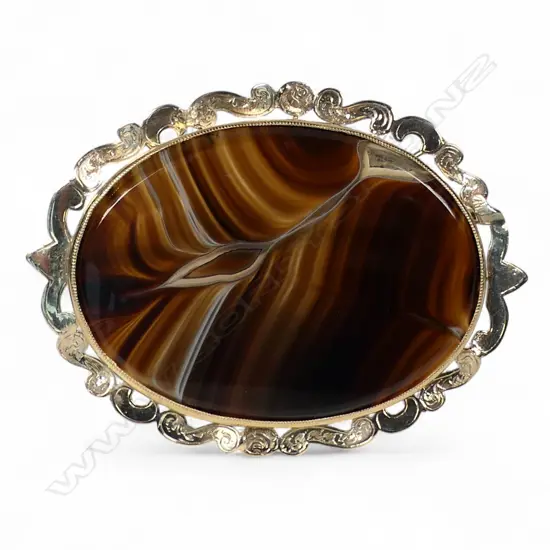 A Victorian large 9ct gold and banded agate brooch,