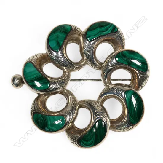 A late Victorian silver and malachite radiating brooch,