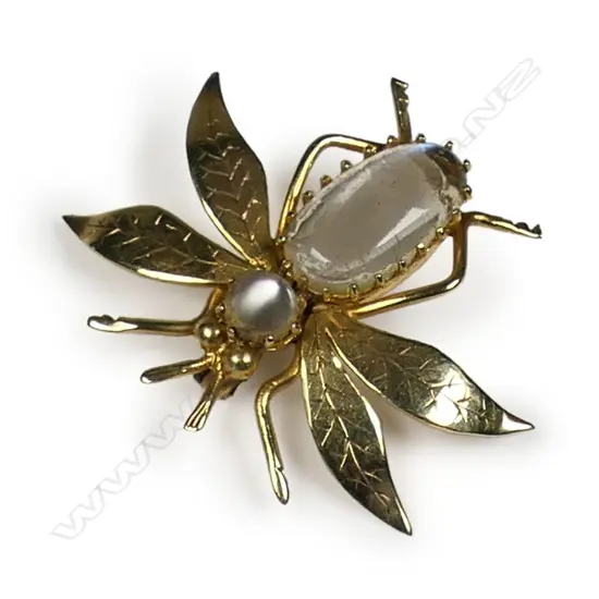 An Edwardian 9ct gold and moonstone flying insect brooch,