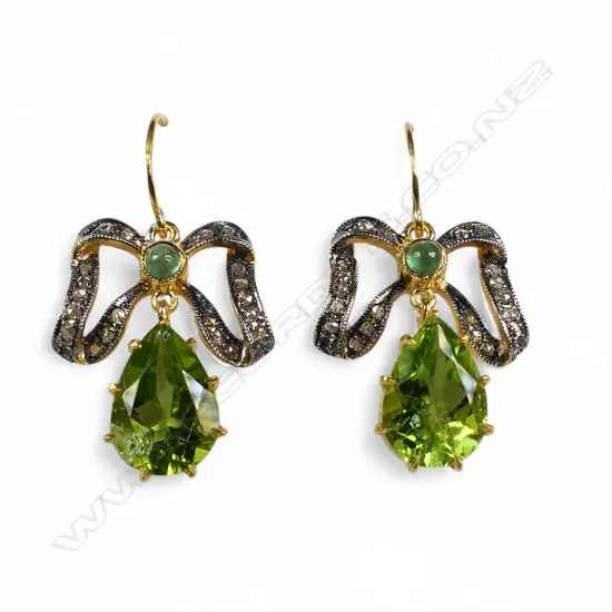 A pair of antique style silver gilt diamond peridot and emerald earrings,