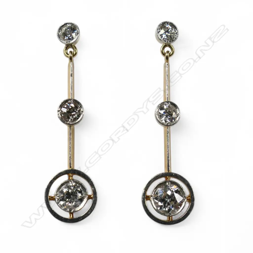 A pair of 9ct gold and diamond drop earrings, Image 1++