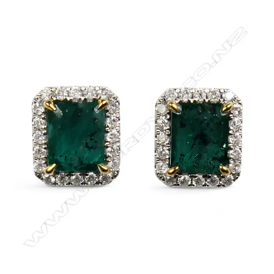 A pair of 14ct white gold emerald and diamond earrings,