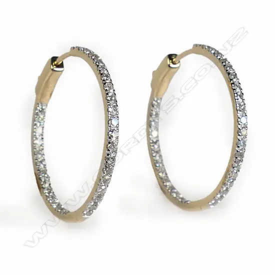 A pair of 14ct gold and diamond hoop earrings,