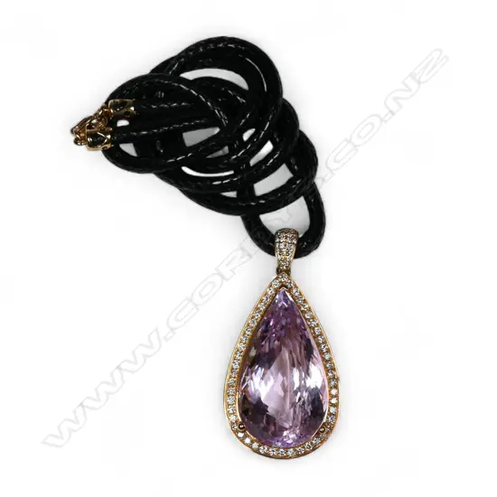 An 18ct rose gold diamond and kunzite pendant,