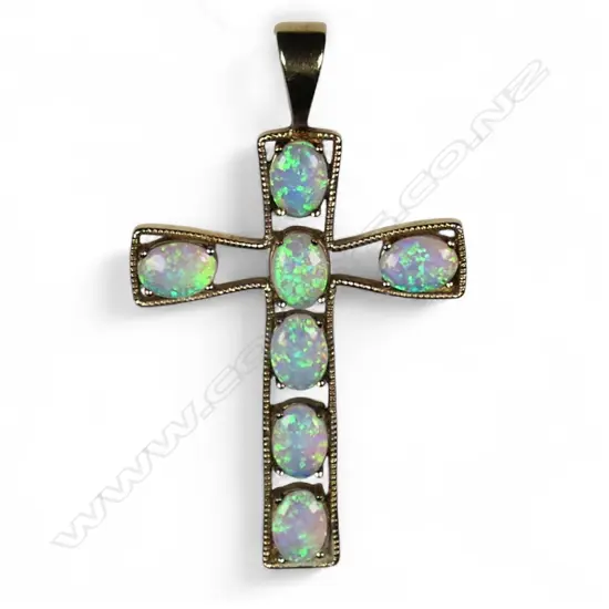 A 9ct gold and opal cross pendant,