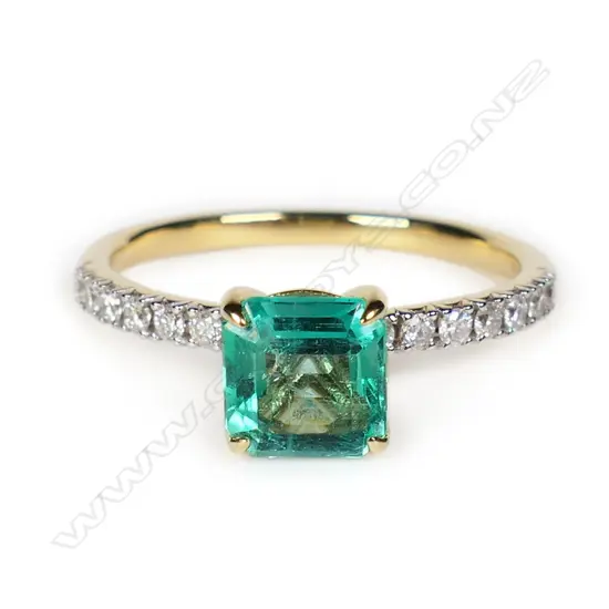 An 18ct gold Colombian emerald and diamond ring,