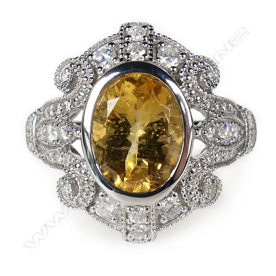 A 14ct white gold golden beryl and diamond antique style ring,