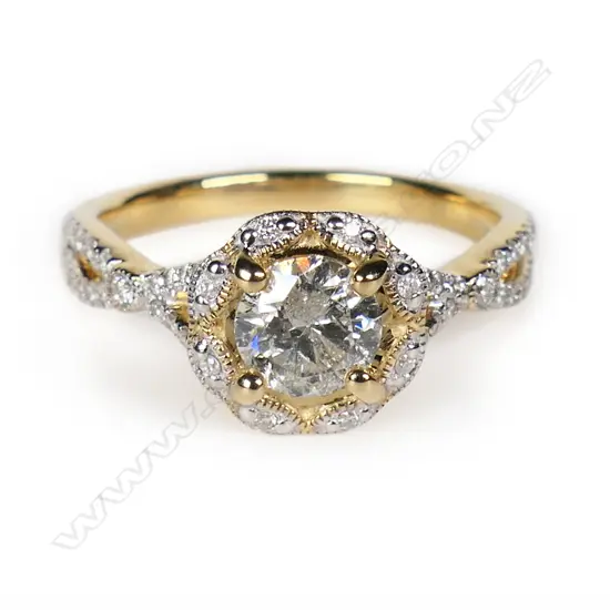 A 14ct gold and diamond halo dress ring,