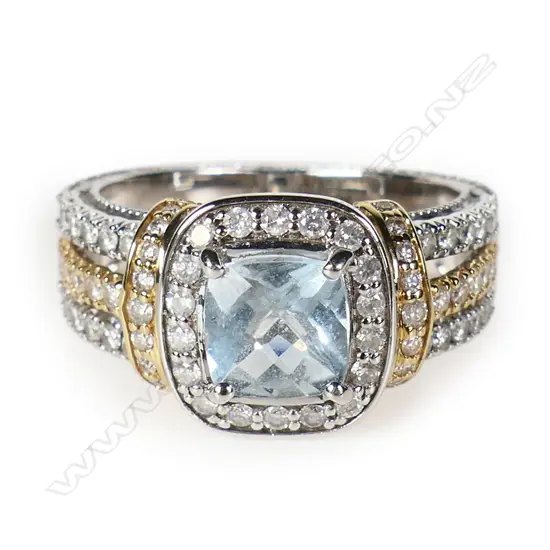 A 14ct yellow and white gold diamond and aquamarine dress ring,