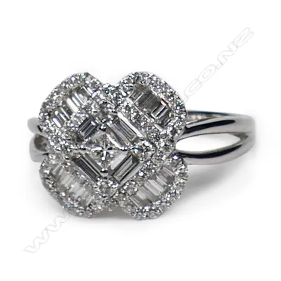 An 18ct white gold and diamond cluster ring,