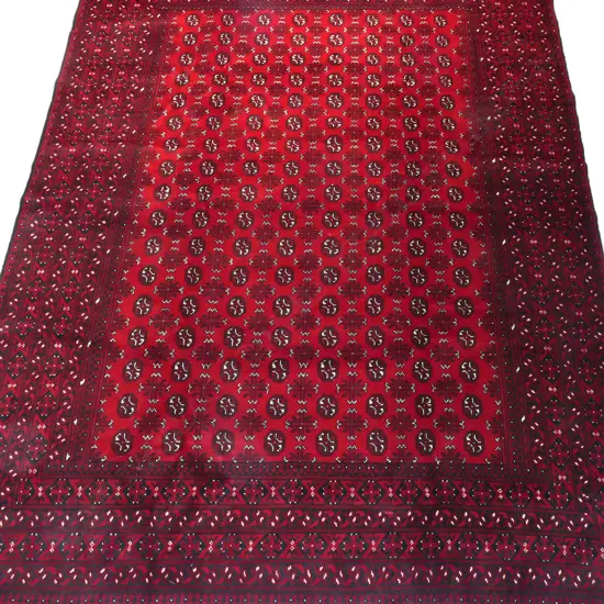 A hand knotted Turkman carpet,