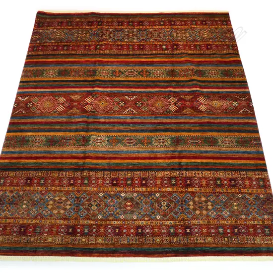 A hand-knotted Kurjeen carpet,