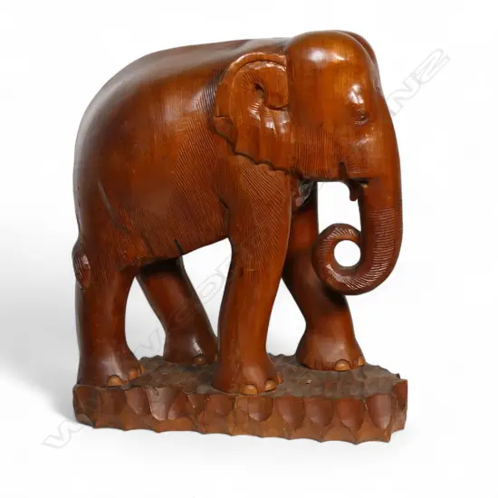 A rare large one piece carved teak Siamese elephant sculpture,
