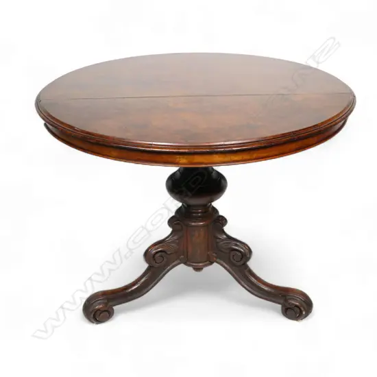 A Victorian walnut small table,