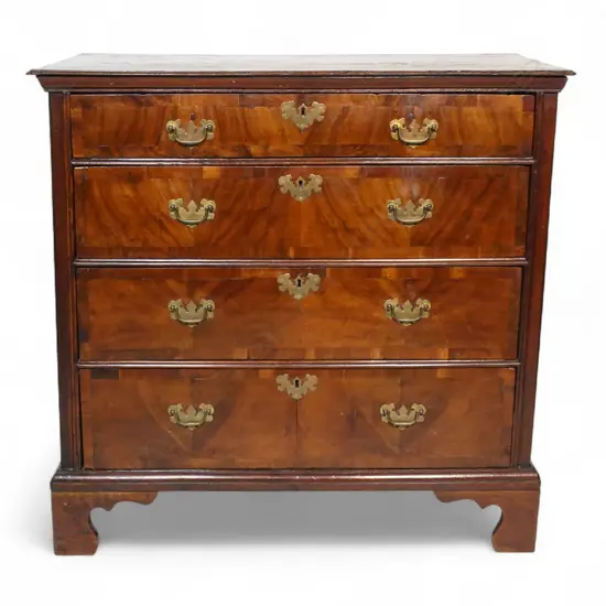 A Georgian oak four drawer chest,