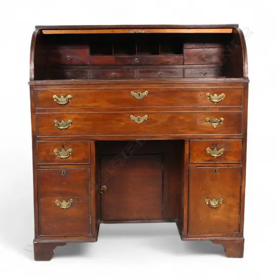 A rare 19thC mahogany drum front pedestal bureau,