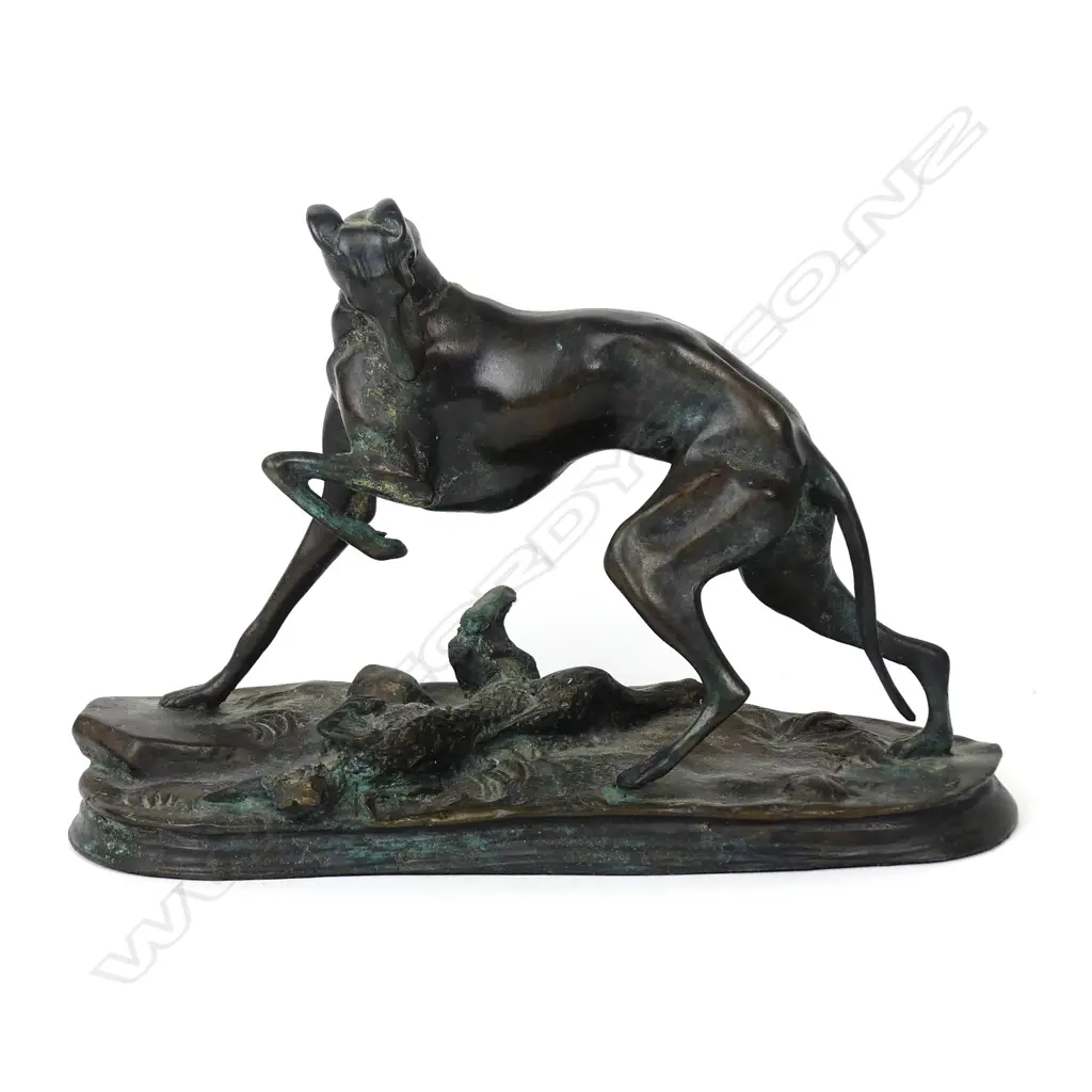A 20thC bronze figure group of a dog with a hare Image 1++