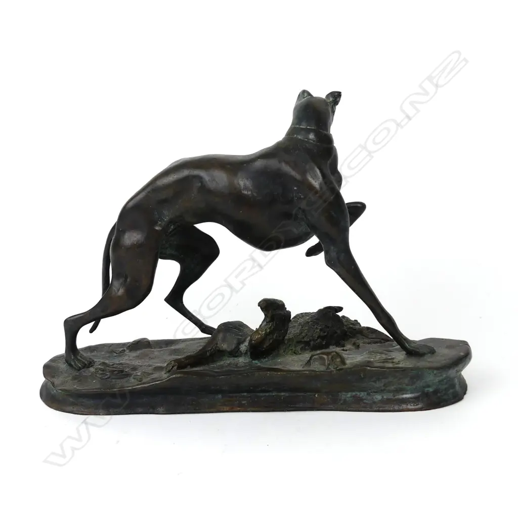 A 20thC bronze figure group of a dog with a hare Image 1++