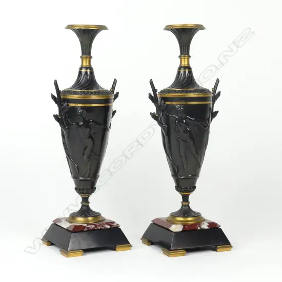 A pair of 19thC French bronze urns