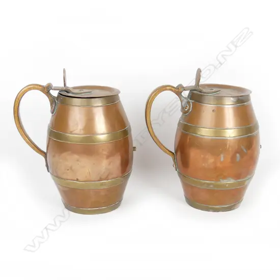 Two 19thC copper and brass barrel shaped tankards