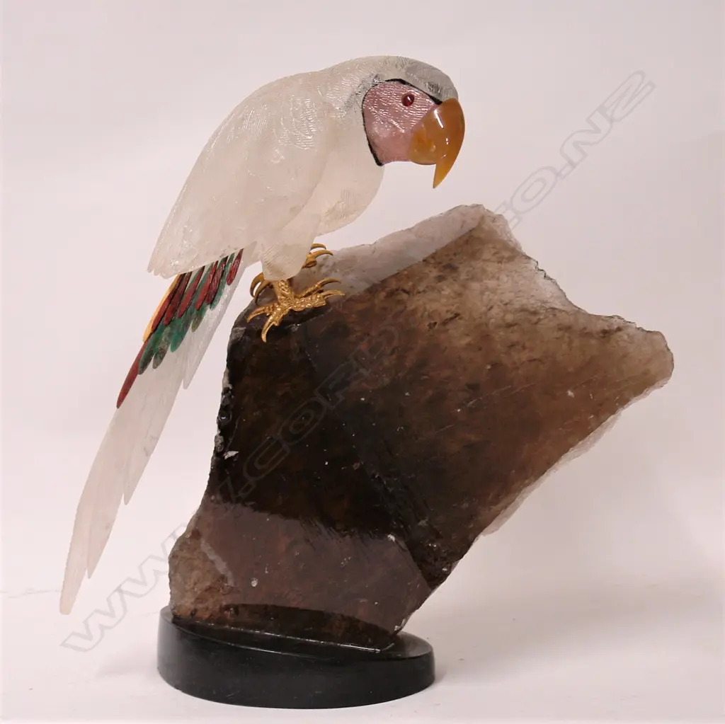 A large and impressive rock crystal carved parrot on quartz crystal slab base Image 1++