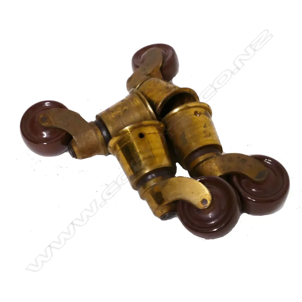 Four large brown ceramic table casters Image 1++