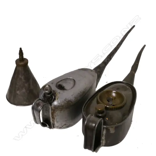 Three vintage oil cans